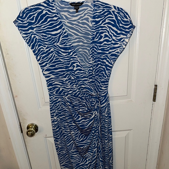 Maggy London Dresses & Skirts - Maggy London Wrap Dress (never worn)